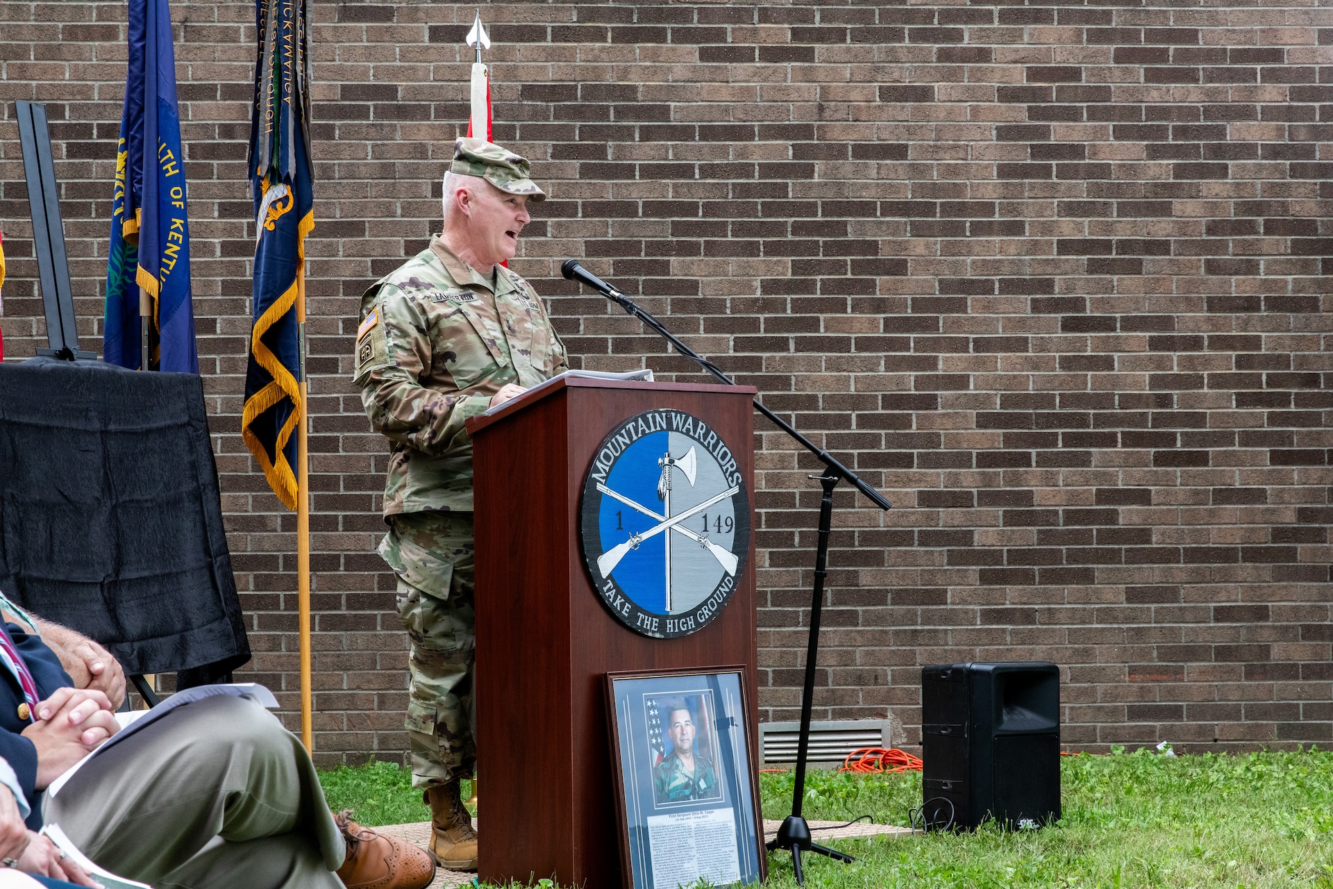 U.S. Army Maj. Gen. Haldane Lamberton gives a speech during the naming ceremony at the Harlan National Guard Armory in Harlan, Kentucky on Sept. 21, 2023. The National Guard armory was named after 1st Sgt. Ottis W. Capps who served as the Alpha Company, 1-149th Infantry full-time support for over 30 years and was a cornerstone of the Harlan National Guard community during his career. (U.S. Army National Guard photo by Andy Dickson)