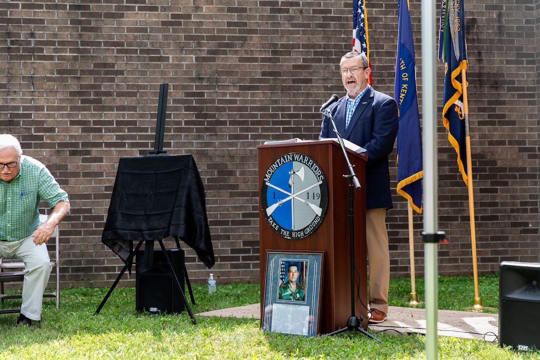 Command Sgt. Maj. Gordon Hinkle, a retired senior enlisted was the master of ceremonies for a naming ceremony at the Harlon National Guard Armory in Harlan, Kentucky on Sept. 21, 2023. The National Guard armory was named after 1st Sgt. Ottis W. Capps who served as the Alpha Company, 1-149th Infantry full-time support for over 30 years and was a cornerstone of the Harlon National Guard community during his career. (U.S. Army National Guard photo by Andy Dickson)