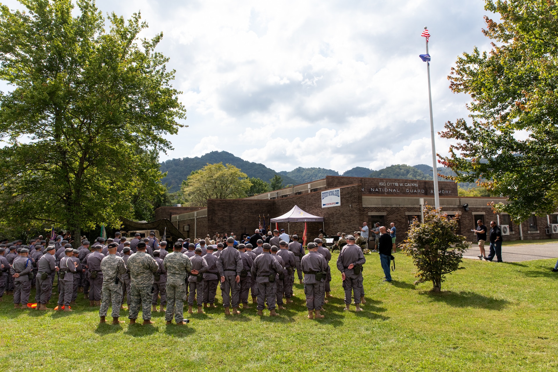 Crowds of Kentucky Army National Guard leadership, veterans, family, and the Kentucky National Guard Appalachian Challenge Academy gathered for the naming ceremony at the Harlan National Guard Armory in Harlan, Kentucky on Sept. 21, 2023. The National Guard armory was named after 1st Sgt. Ottis W. Capps who served as the Alpha Company, 1-149th Infantry full-time support for over 30 years and was a cornerstone of the Harlan National Guard community during his career. (U.S. Army National Guard photo by Andy Dickson)