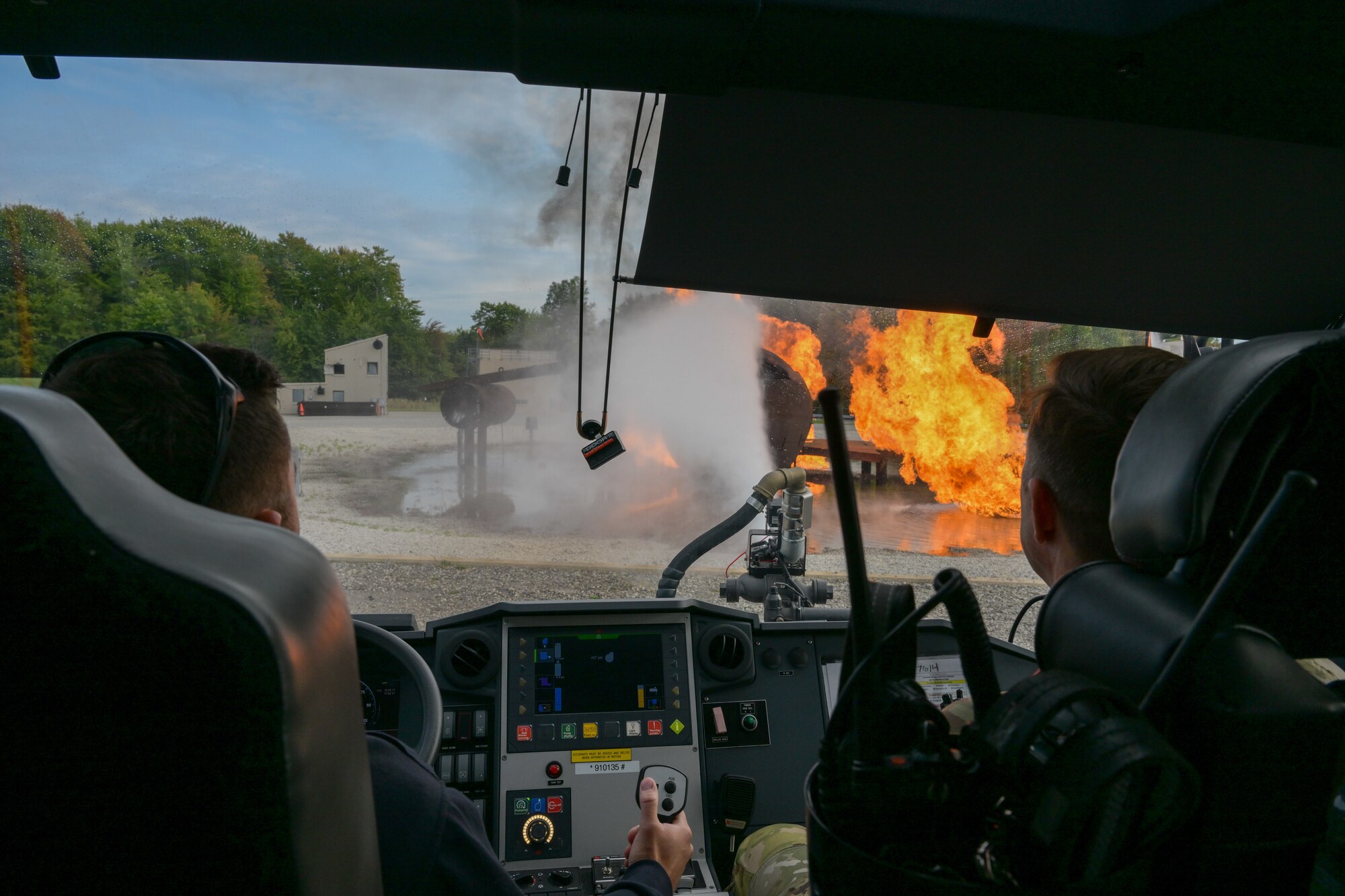 Nickolas Savoia, a Youngstown Air Reserve Station firefighter, controls the water turret on the installation's Panther fire truck, at YARS, Sept. 21, 2023.