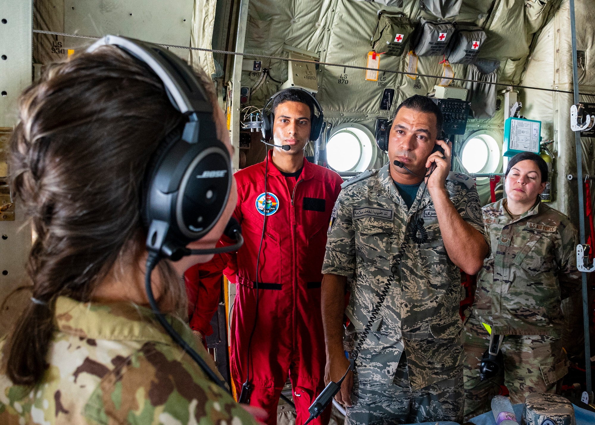 U.S. Air Force Capt. Courtney Shockley, Flight Nurse assigned to the 405th Expeditionary Aeromedical Evacuation Squadron at the 386th Air Expeditionary Wing, demonstrates to Egyptian military members the use of the portable communication devices that medical technicians and nurses use during flight in support of exercise Bright Star 23, Sept. 10, 2023.