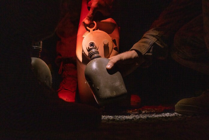 A U.S. Marine Corps recruit refills a canteen with water during the crucible at Marine Corps Base Camp Pendleton, Calif., Sept. 20, 2023. The Crucible is a 54-hour long culminating event during recruit training that finalizes the transformation from recruit to Marine. (U.S. Marine Corps photo by Lance Cpl. Janell B. Alvarez)