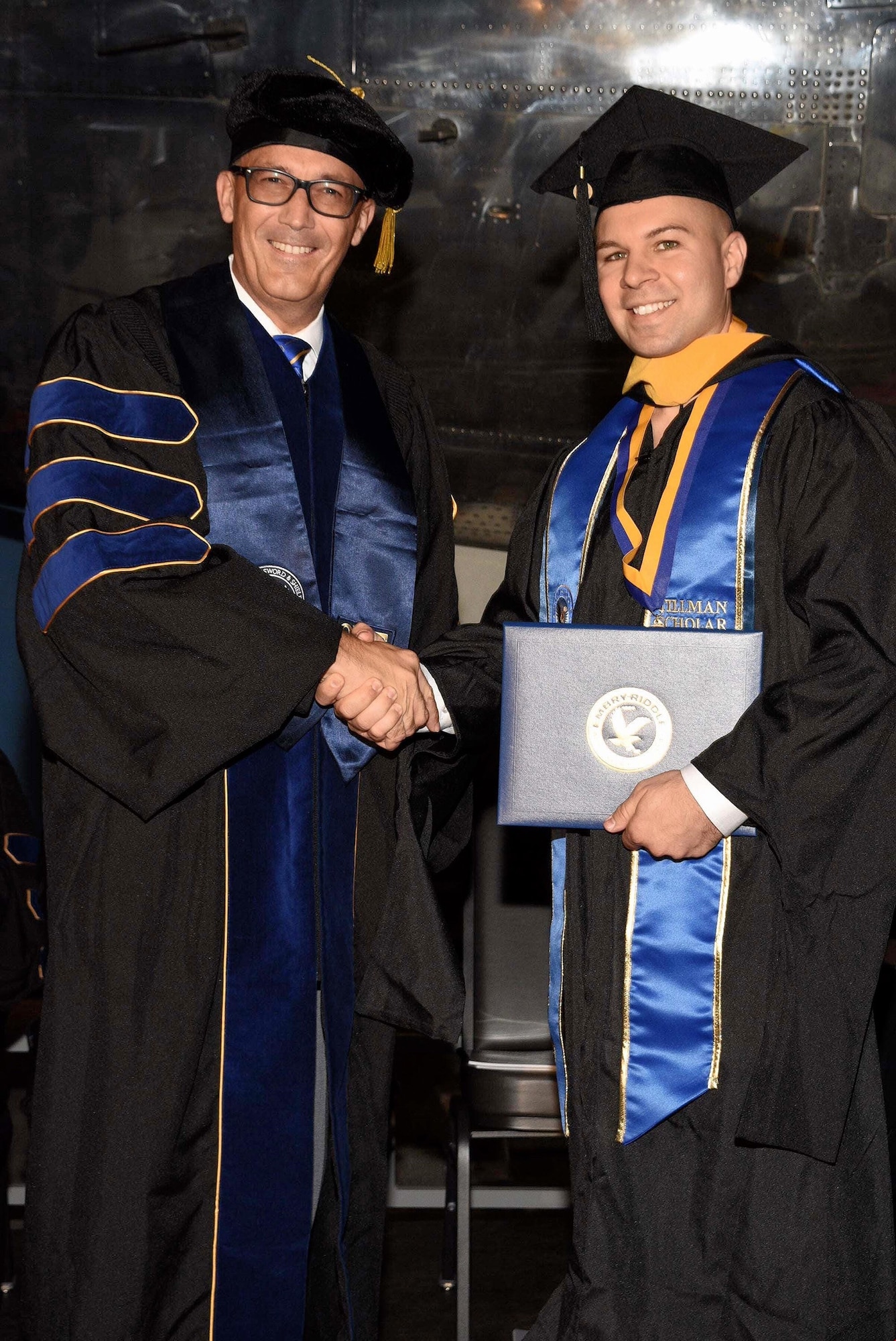 air force master sergeant receives master degree from college