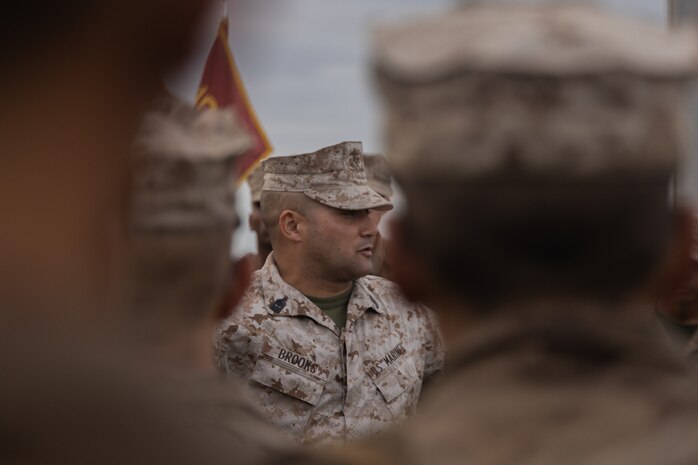 U.S. Marine Corps 1st Sgt. Jason Brooks, a company first sergeant with Bravo Company, 1st Recruit Training Battalion, briefs new Marines during the Eagle Globe and Anchor ceremony at Marine Corps Base Camp Pendleton, Sept. 20, 2023. After completing the 54-hour culminating event, recruits are given their Eagle, Globe, and Anchors, earning them the title “United States Marine.” Brooks is a native of Seattle, Wash. (U.S. Marine Corps photo by Lance Cpl. Janell B. Alvarez)