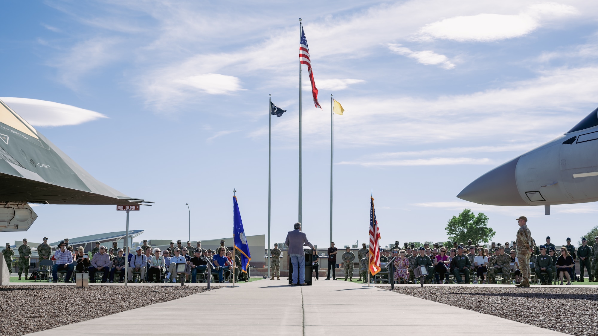 Community members and personnel from the 49th Wing congratulate retired U.S. Air Force Gen. David L. Goldfein during a street renaming ceremony at Holloman Air Force Base, New Mexico, Sept. 22, 2023. A street here was renamed to honor the 21st Chief of Staff of the U.S. Air Force and previous Holloman commander, U.S. Air Force Gen. David L. Goldfein. (U.S. Air Force photo by Senior Airman Antonio Salfran)