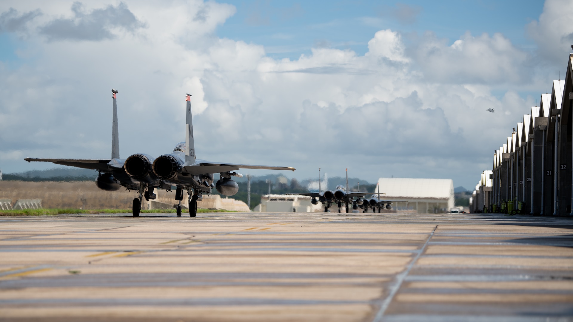 F-15E Strike Eagles assigned to the 391st Fighter Squadron taxi to the runway during a no-notice fighter dispersal exercise at Kadena Air Base, Japan, Sept. 22, 2023. The exercise tested the 18th Wing’s ability to rapidly generate airpower to defend Japan and ensure regional stability. (U.S. Air Force photo by Staff Sgt. Jessi Roth)