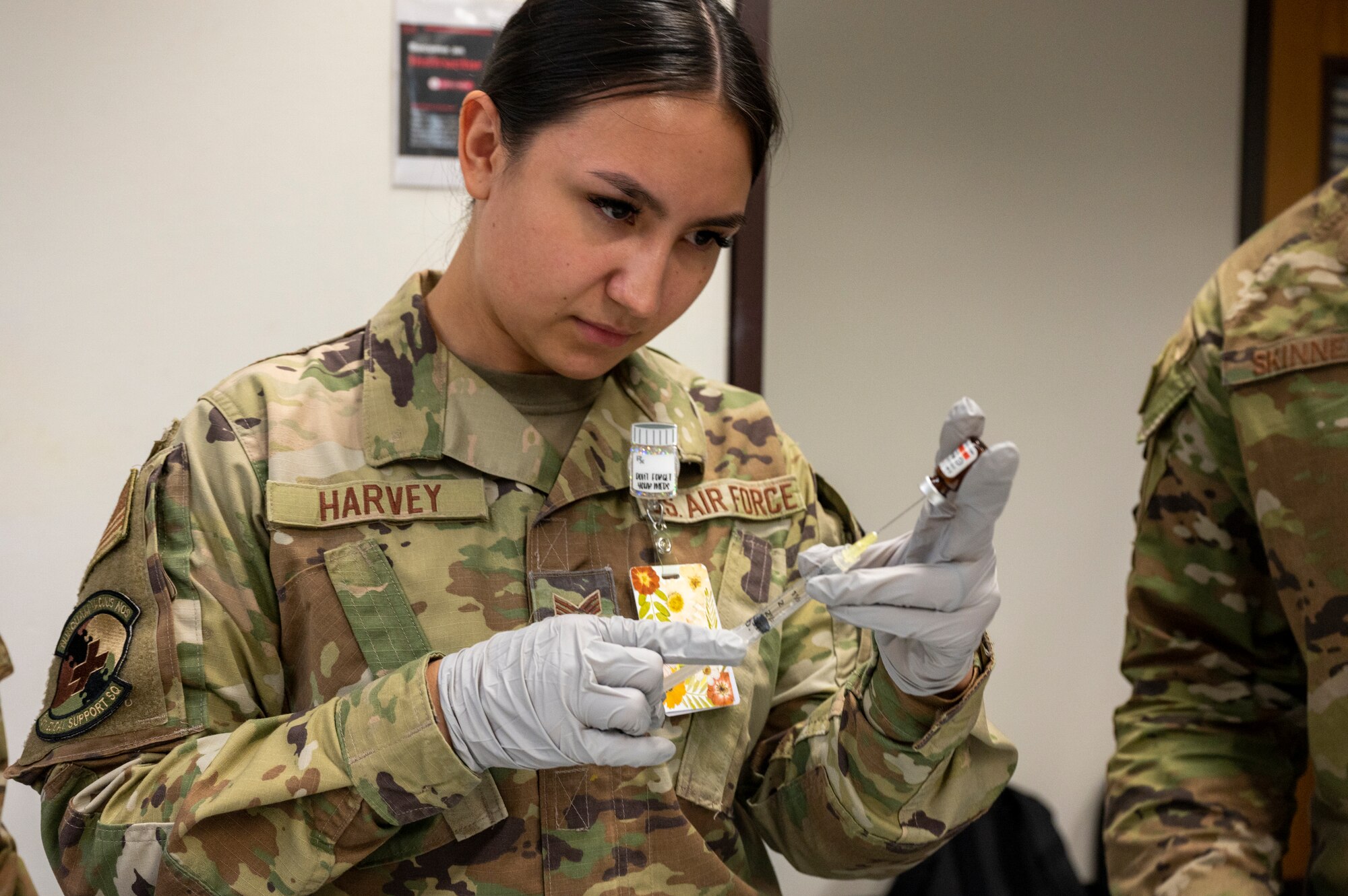 U.S. Air Force Senior Airman Patricia Harvey, 51st Medical Support Squadron pharmacy technician, prepares pain medication and antibiotics for simulated patients during a mass casualty training event at Osan Air Base, Republic of Korea, Sept. 21, 2023. Consistent training is a critical component of mission readiness and execution; it directly relates to the successful accomplishment of the 51st Fighter Wing’s missions by ensuring personnel are well-prepared to handle casualties, maintain operational tempo and adapt to the challenges they may encounter in the field. (U.S. Air Force photo by Senior Airman Aaron Edwards)