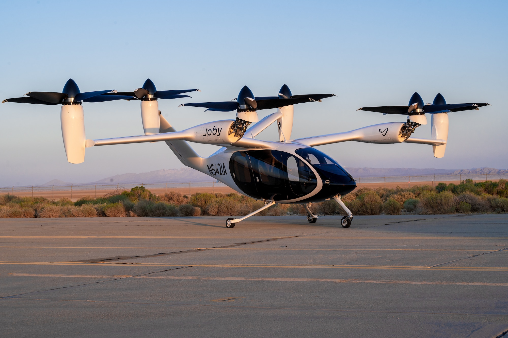A Joby Aviation, Inc. experimental electronic vertical take-off and landing aircraft is parked at taxi way following a ground test at Edwards Air Force Base, California, Sept. 20. (Air Force photo by Harlan Huntington)