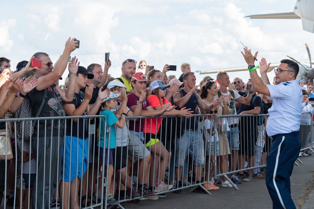 U.S. Air Force Maj. Rafael F. Toro-Quiñones, U.S. Air Forces in Europe Band commander and conductor, riles up the crowd during the NATO Days event at Leoš Janáček Airport in Ostrava, Czech Republic, Sept. 17, 2023.