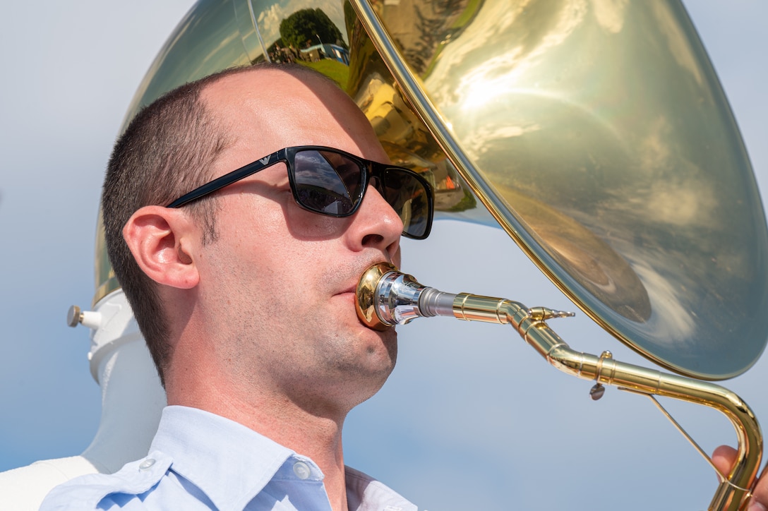 U.S. Air Force Staff Sgt. Will Dellinger, U.S. Air Forces in Europe Ceremonial Band tubist, performs during the NATO Days event at Leoš Janáček Airport in Ostrava, Czech Republic, Sept. 17, 2023. The USAFE Band serves as a bridge to increase cultural ties and enrich the partnerships between the U.S. and Czech Republic through music. (U.S. Air Force photo by Airman 1st Class Christopher Campbell)