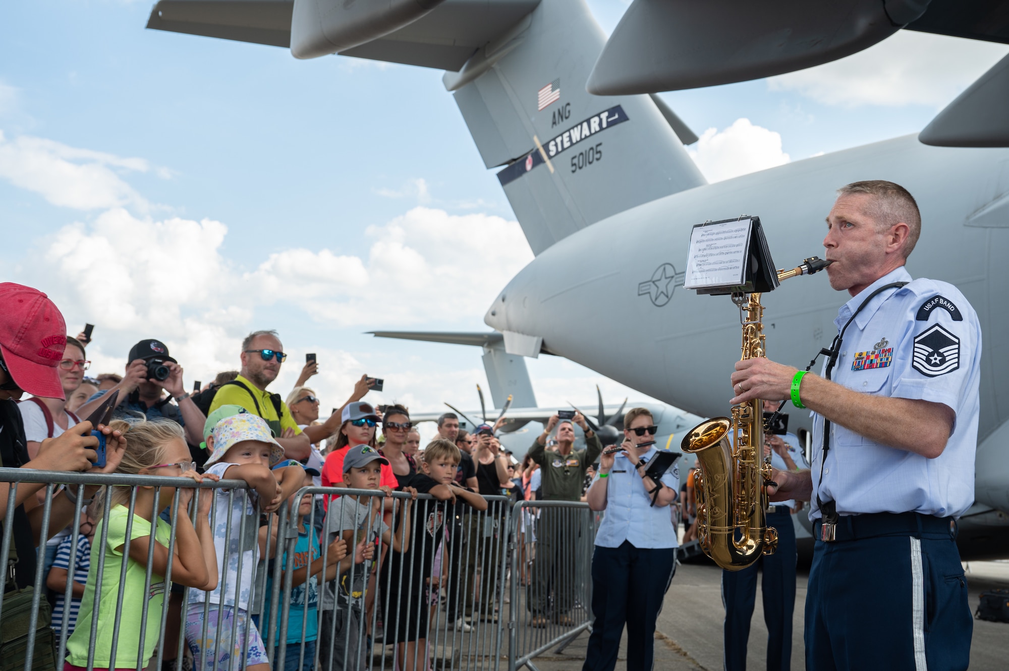 U.S. Air Force Master Sgt. Brian Connolly, U.S. Air Forces in Europe Ceremonial Band saxophonist, performs a solo during the NATO Days event at Leoš Janáček Airport in Ostrava, Czech Republic, Sept. 17, 2023.