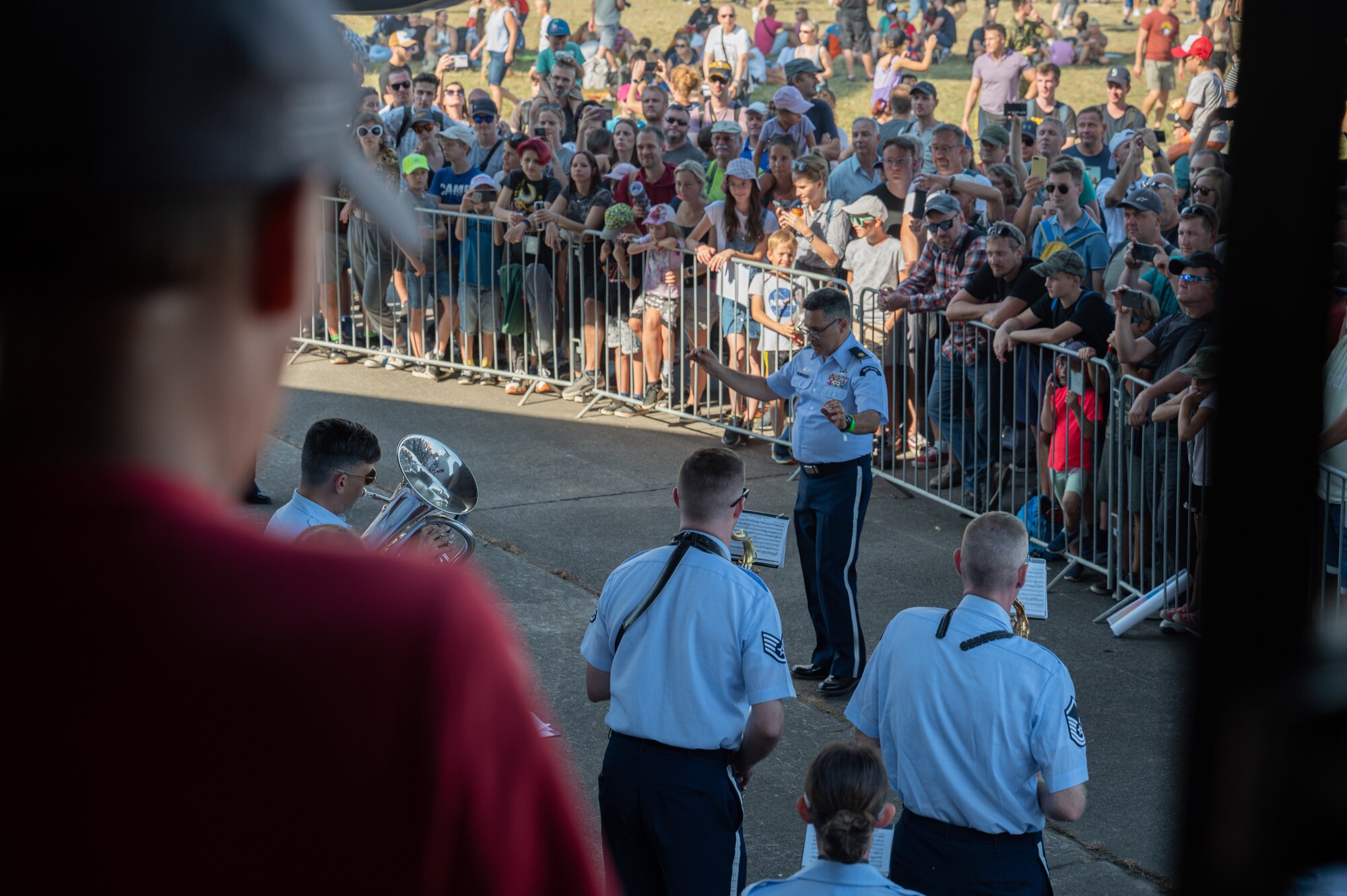 A Czech child watches the U.S. Air Forces in Europe Ceremonial Band perform during the NATO Days event, at Leoš Janáček Airport in Ostrava, Czech Republic, Sept. 16, 2023.