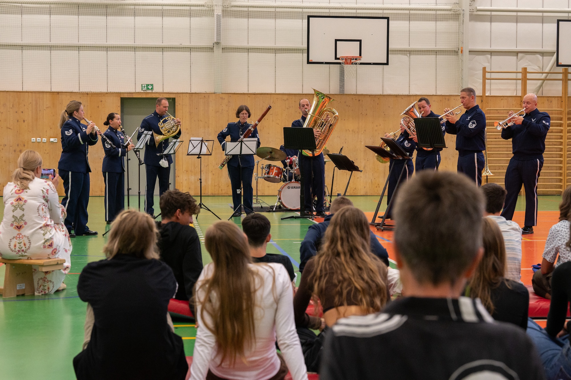 U.S. Air Force Airmen assigned to the U.S. Air Forces in Europe Band perform for students at Silesian Grammar School Opava in Opava, Czech Republic, Sept. 14, 2023.