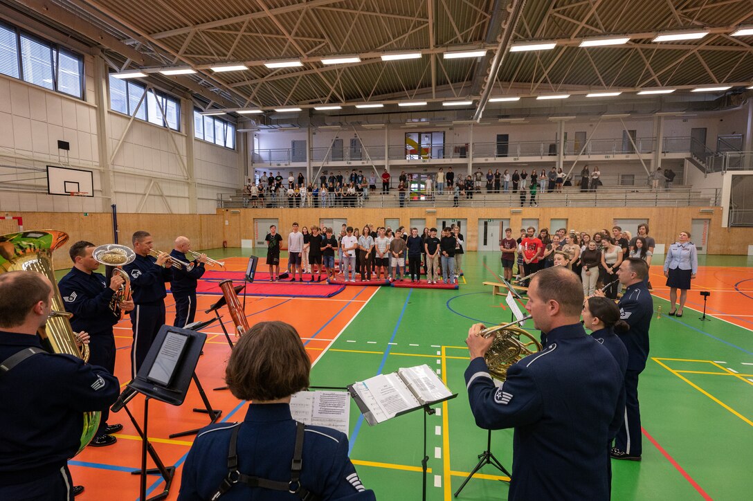 Czech students stand for the U.S. Air Forces in Europe Band as they perform the Czech national anthem at Silesian Grammar School Opava in Opava, Czech Republic, Sept. 14, 2023.