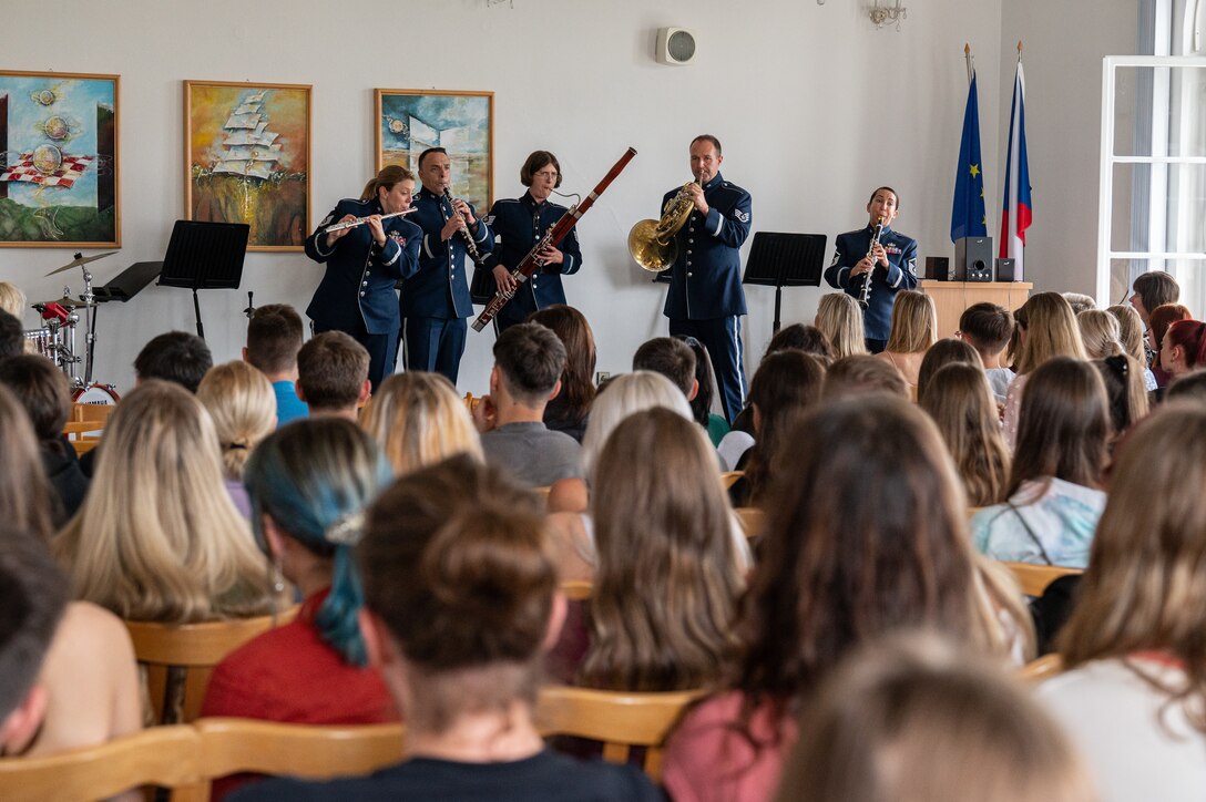 U.S. Air Force Airmen assigned to the U.S. Air Forces in Europe Band’s Winds Aloft Woodwind Quintet, perform for students at the Secondary School of Nursing in Opava, Czech Republic, Sept. 14, 2023. The USAFE Band traveled to multiple cities in the Czech Republic, Sept. 14 to 17, to showcase the U.S. commitment to NATO allies in the European area of responsibility. (U.S. Air Force photo by Airman 1st Class Christopher Campbell)