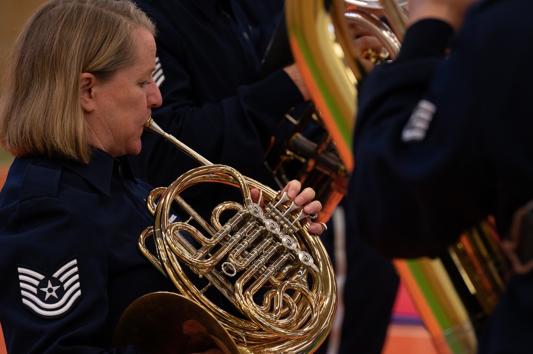 U.S. Air Force Tech. Sgt. Libby Barnette, U.S. Air Forces in Europe Band’s Five Star Brass Quintet with drums horn player, performs at Silesian Grammar School Opava in Opava, Czech Republic, Sept. 14, 2023. The USAFE Band performed in different cities in the Czech Republic as part of a short tour before the commencement of the annual NATO Days event. (U.S. Air Force photo by Airman 1st Class Christopher Campbell)