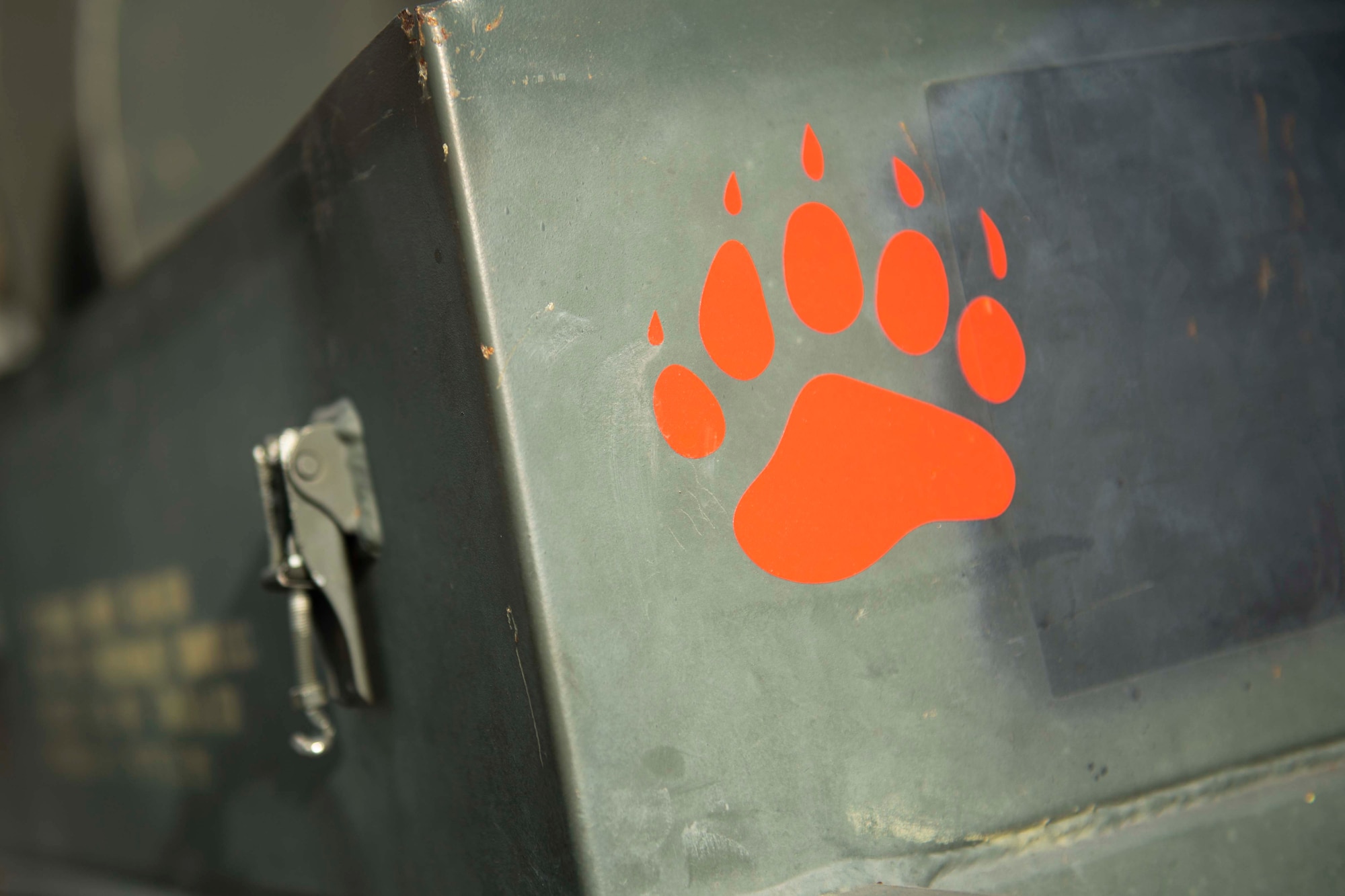 An icon depicts a bear's paw print on a piece of metal equipment.