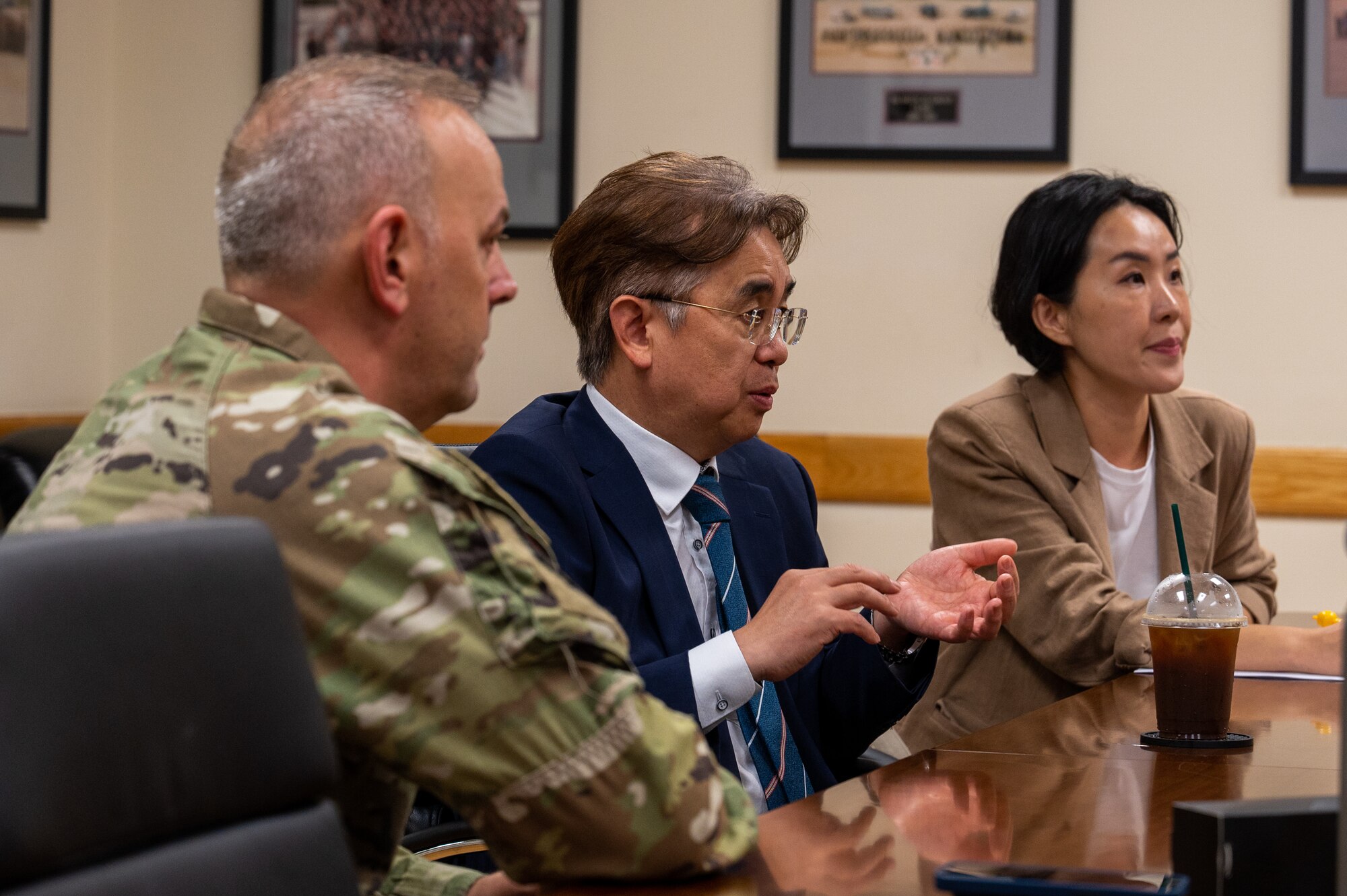 Seo II-Young center, speaks to 8th Medical Group leaders during the grand opening of the medical shuttle service.