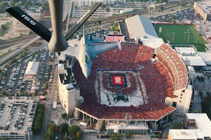 A KC-135R Stratotanker assigned to the 155th Air Refueling Wing along with an F-16 from the 114th Fighter Wing fly over over Memorial Stadium, Lincoln, Nebraska, Aug. 30, 2023, for a University of Nebraska volleyball game. The flyover celebrated Volleyball Day in Nebraska, where 92,003 fans became the largest crowd in the world to witness a women’s sporting event.