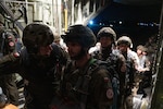 Polish soldiers assigned to the 16th Airborne Battalion, 6th Airborne Brigade, from Kraków, Poland, board a U.S. Air Force C-130J Super Hercules at the John Paul II International Airport Kraków-Balice, during Aviation Detachment Rotation 23-4, Sept. 14, 2023. ADR is a bilateral training exercise with the Polish military to enhance allied interoperability, maintain joint readiness, and assure regional allies of NATO capabilities.