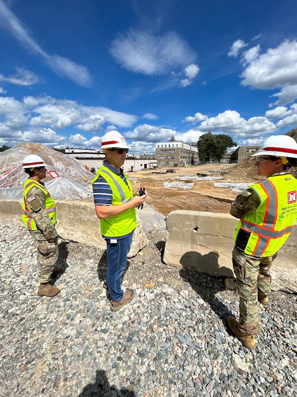 Cadet Leo Puntillo and Capt. Sarah Hoyt get a briefing from Mark Anderson at the MIT/Lincoln Labs project in Massachusetts.