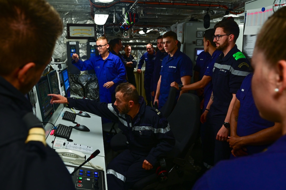 The crew of U.S. Coast Guard Cutter Forward (WMEC 911) tour the French navy vessel BSAM Garonne’s engine control center in the Atlantic Ocean, Aug. 13, 2023. Forward deployed in support of Op Nanook, an annual Canadian-led exercise that offers an opportunity to work with partners to advance shared maritime objectives. (U.S. Coast Guard photo by Petty Officer 3rd Class Mikaela McGee)
