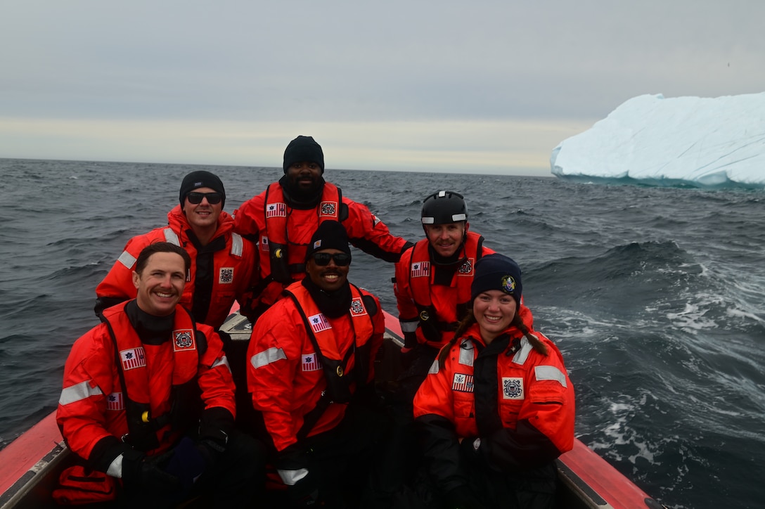 Members assigned to the U.S. Coast Guard Cutter Forward (WMEC 911) pose for a group photo aboard the unit's small boat in the Atlantic Ocean, Aug. 22, 2023. Forward deployed in support of Op Nanook, an annual Canadian-led exercise that offers an opportunity to work with partners to advance shared maritime objectives. (U.S. Coast Guard photo by Petty Officer 3rd Class Mikaela McGee)
