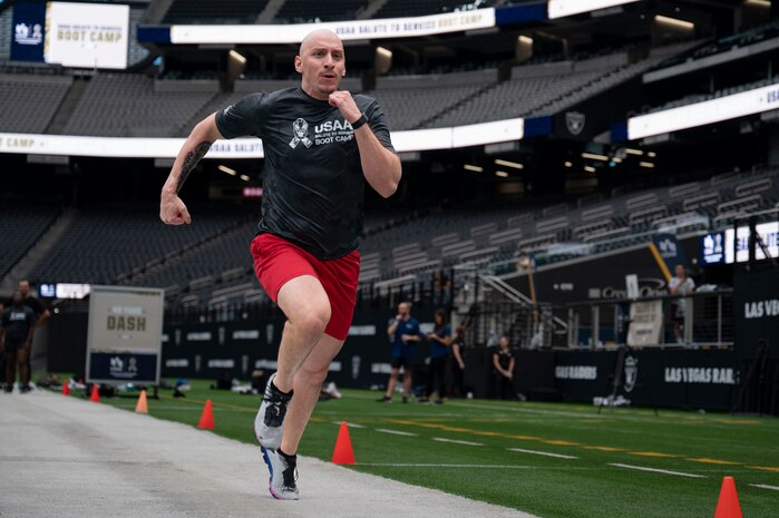 A U.S. Air Force Airman runs a 40-yard dash during the United Services Automobile Association Salute to Service Bootcamp at Allegiant Stadium, Las Vegas, Nevada, Sept. 19, 2023.
