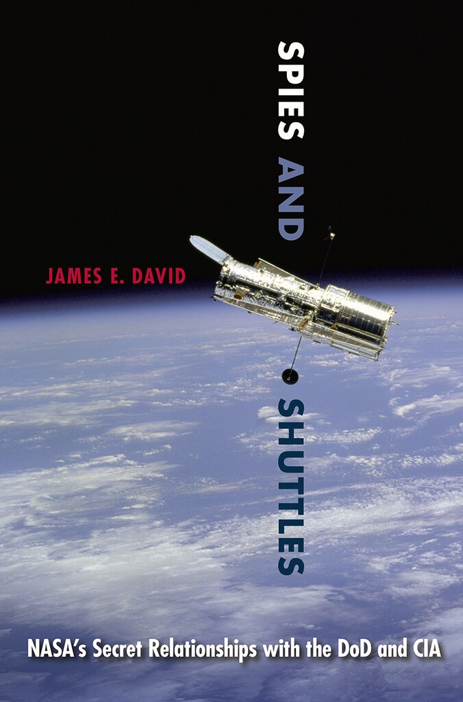 Book Review by Carlos Barrera and Manuel Carranza of: 
Spies and Shuttles: NASA’s Secret Relationship with the DoD and CIA

Author: James E. David

Reviewed by Professor Carlos Barrera, Mexican Institute for Strategic Studies in National Security and Defence, and Manuel Carranza, defense and security affairs researcher

Starting with the 1957 launches of the Soviet Union’s Sputnik 1 and 2, James E. David’s autobiography “offers a cautionary tale on grandiloquent endeavors and highlights the need to prioritize planning over narrative” in space. David was a curator in the Division of Space History at the Smithsonian National Air and Space Museum, which gave him access to newly declassified materials. He put this information to good use in Spies and Shuttles as he chronicles NASA’s history and impact.