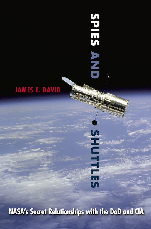 Book Review by Carlos Barrera and Manuel Carranza of: 
Spies and Shuttles: NASA’s Secret Relationship with the DoD and CIA

Author: James E. David

Reviewed by Professor Carlos Barrera, Mexican Institute for Strategic Studies in National Security and Defence, and Manuel Carranza, defense and security affairs researcher

Starting with the 1957 launches of the Soviet Union’s Sputnik 1 and 2, James E. David’s autobiography “offers a cautionary tale on grandiloquent endeavors and highlights the need to prioritize planning over narrative” in space. David was a curator in the Division of Space History at the Smithsonian National Air and Space Museum, which gave him access to newly declassified materials. He put this information to good use in Spies and Shuttles as he chronicles NASA’s history and impact.