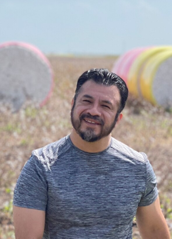 Silvino Gonzalez, a Hispanic man wearing a gray t-shirt