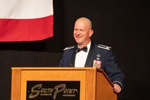 U.S. Air Force Col. Joshua DeMotts, the 99th Air Base Wing commander, addresses the audience during the 2023 Air Force Ball opening ceremony in Las Vegas, Nevada, Sept. 16, 2023.