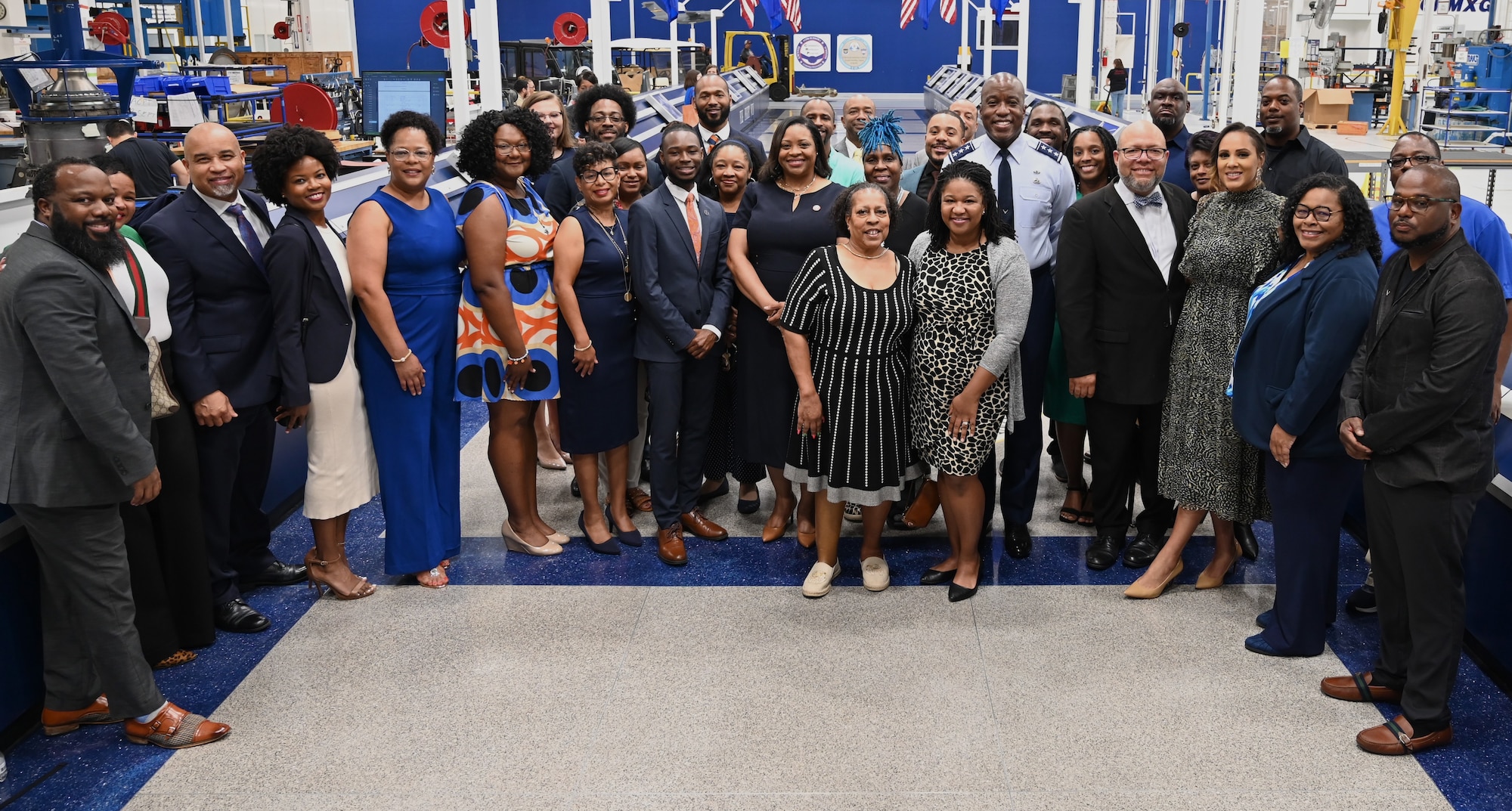 U.S. Air Force Lt. Gen. Stacey T. Hawkins, Air Force Sustainment Center commander, Dr. Ruth Ray Jackson, Langston University interim president, and LU staff and alumni pose for a picture.