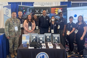 Chief of Staff of the Air Force Gen. CQ Brown, Jr. poses with members of the Secretary of the Air Force Diversity and Inclusion team at the Air & Space Forces Association’s 2023 Air, Space & Cyber Conference Sept. 13, 2023, at the Gaylord National Resort & Convention Center in National Harbor, Md. SAF DI’s presence at the conference was paramount at the Air, Space & Cyber Conference which provided first-class professional military development and the shared emerging requirements and technologies to help fuel connections that advance the cause of air and space power. (U.S. Air Force courtesy photo)