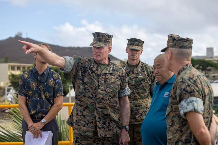 U.S. Marine Corps Lt. Gen. Edward D. Banta, Deputy Commandant of Installations and Logistics, center, discusses installation water treatment measures with staff members of the Water Reclamation Facility on Marine Corps Base Hawaii, Sept. 13, 2023. Banta visited MCBH to gain insight into current base modernization efforts to meet the demands of a constantly evolving strategic environment in accordance with Force Design 2030. (U.S. Marine Corps photo by Cpl. Cody Purcell)