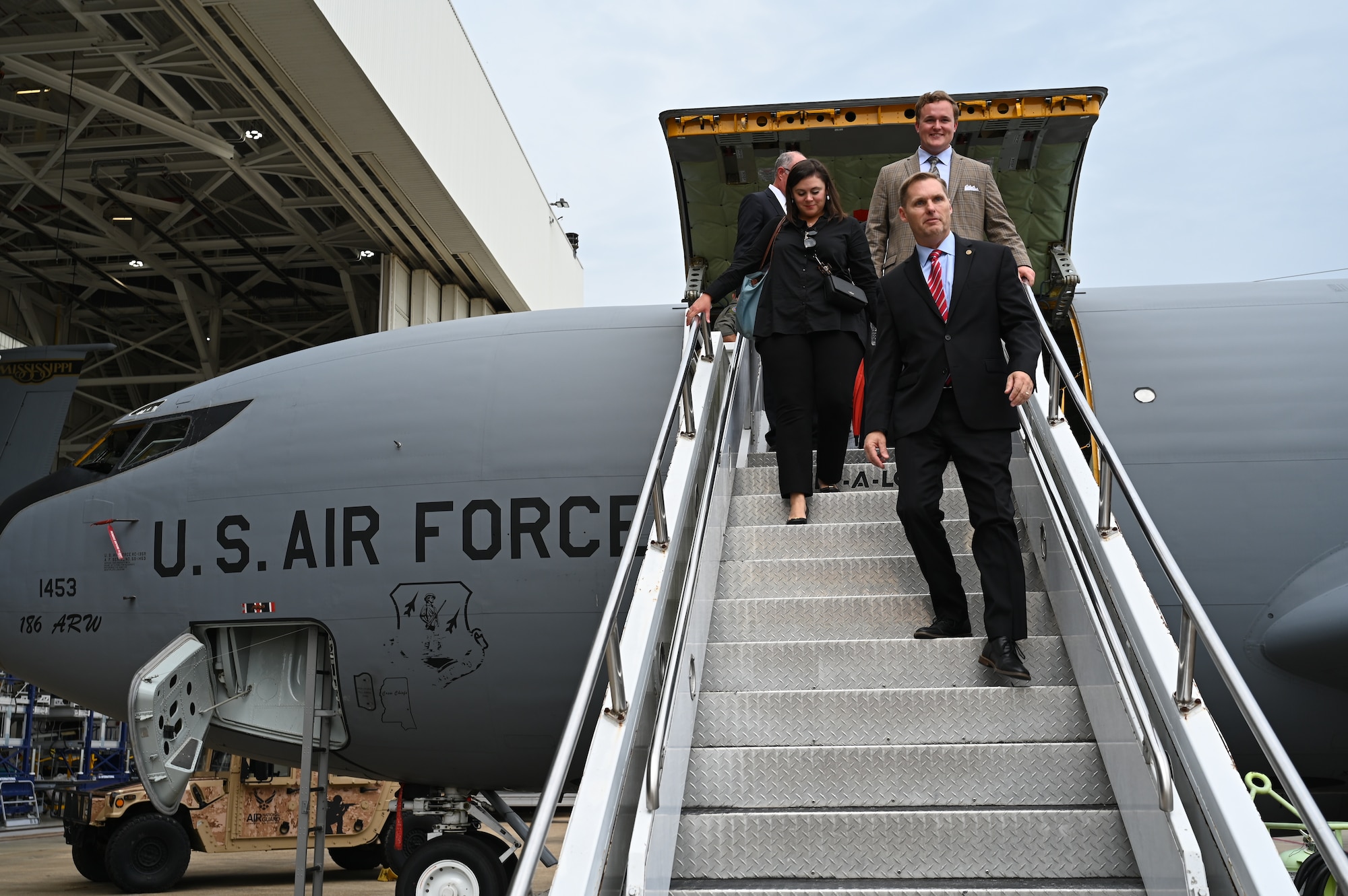 Congressman Michael Guest departs a KC-135R Stratotanker at Key Field Air National Guard Base, Meridian, Mississippi, Sept. 25, 2023, following a tour of the aircraft. Earlier, Congressman Guest held a roundtable at the 186th Air Refueling Wing to discuss efforts to bring the KC-46 Pegasus aircraft, the next generation of aerial refueling, to the base.