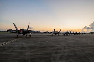 a photo of F-35s lined up on the flight line