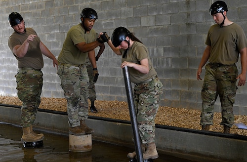 people participate in a team building exercise