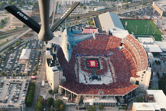 A KC-135R Stratotanker assigned to the 155th Air Refueling Wing along with an F-16 from the 114th Fighter Wing fly over over Memorial Stadium, Lincoln, Nebraska, Aug. 30, 2023, for a University of Nebraska volleyball game. The flyover celebrated Volleyball Day in Nebraska, where 92,003 fans became the largest crowd in the world to witness a women’s sporting event.