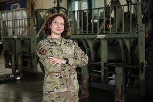 Senior Airman Stephanie Hawthorne, 647th Logistics Readiness Squadron combat mobility flight journeyman, shares her story on being selected for Officer Training School on Aug. 1, 2023. Hawthorne, with a Bachelor of Science in mechanical engineering from Puerto Rico, was selected to attend OTS to join the U.S. Space Force. She plans to pursue a master's degree in space studies. (U.S. Air Force photo by Staff Sgt. Alan Ricker)