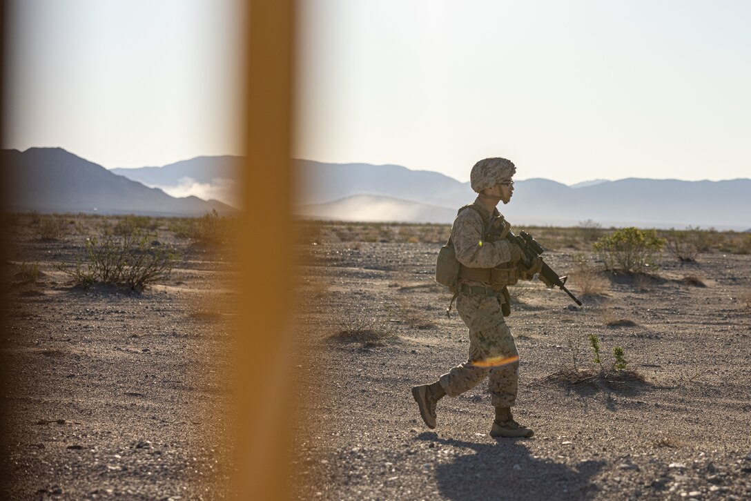 U.S. Marine Corps Pfc. Julien Kleiv, a military police officer assigned to Military Police Company C, 4th Law Enforcement Battalion, Force Headquarters Group, Marine Forces Reserve, conducts a perimeter check during a Motorized Operators Course at Marine Corps Air-Ground Combat Center Twentynine Palms, California, as part of Integrated Training Exercise 4-23, June 14, 2023. As the Marine Corps Reserve’s premier annual training event, ITX provides opportunities to mobilize geographically dispersed forces for a deployment; increase combat readiness and lethality; and exercise MAGTF command and control of battalions and squadrons across the full spectrum of warfare. Kleiv is a native of Hilliard, Ohio and attended Bradley High School. (U.S. Marine Corps Photo by Lance Cpl. Juan Diaz)