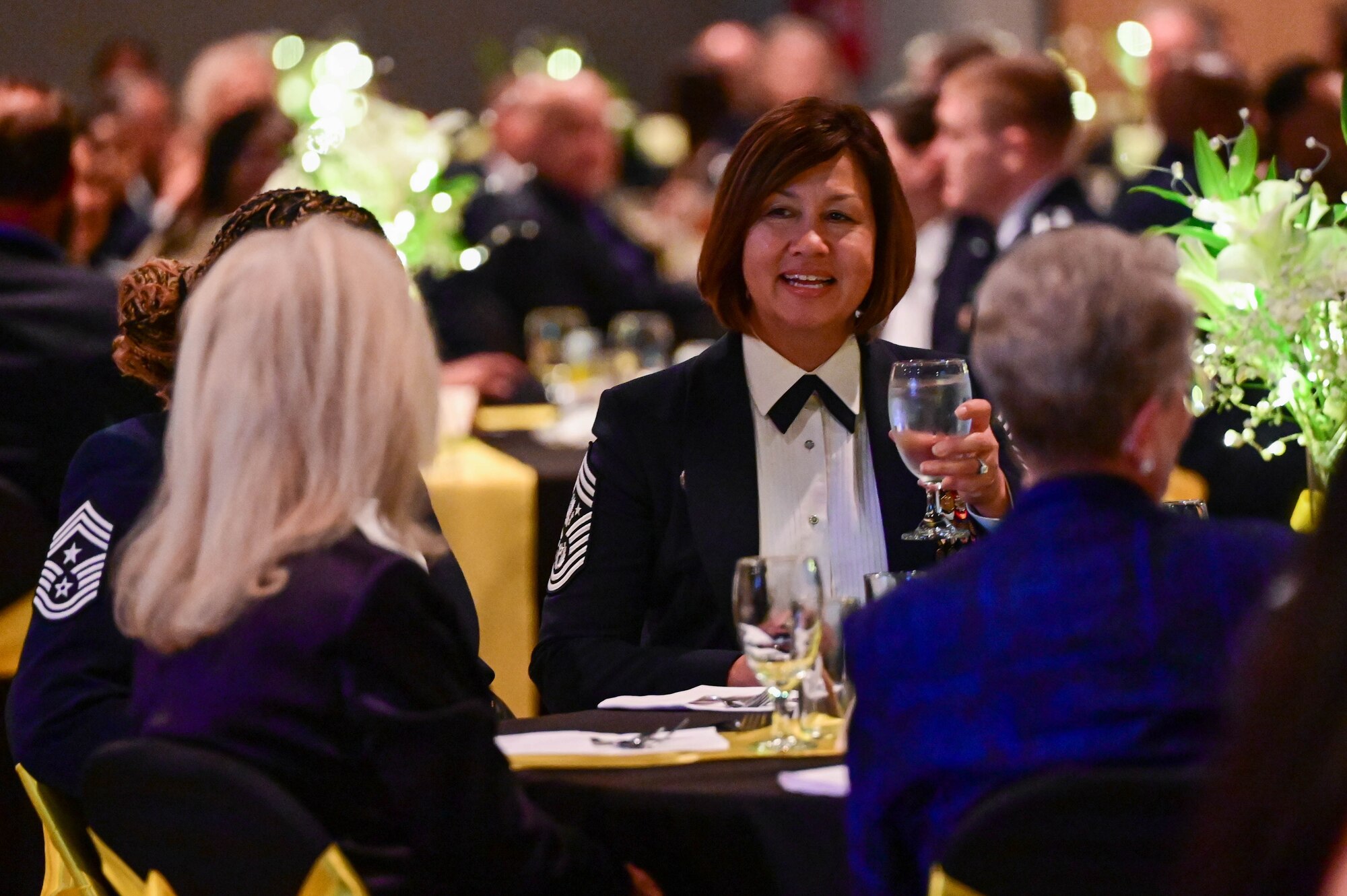 Chief Master Sgt. of the Air Force JoAnne Bass speaks with San Angelo civic leaders at the McNease Convention Center, San Angelo, Texas, Sept. 23, 2023. Bass attended the 76th Air Force Ball with Goodfellow and celebrated the 30th anniversary of the 17th Training Wing. (U.S. Air Force photo by Airman 1st Class Madison Collier)