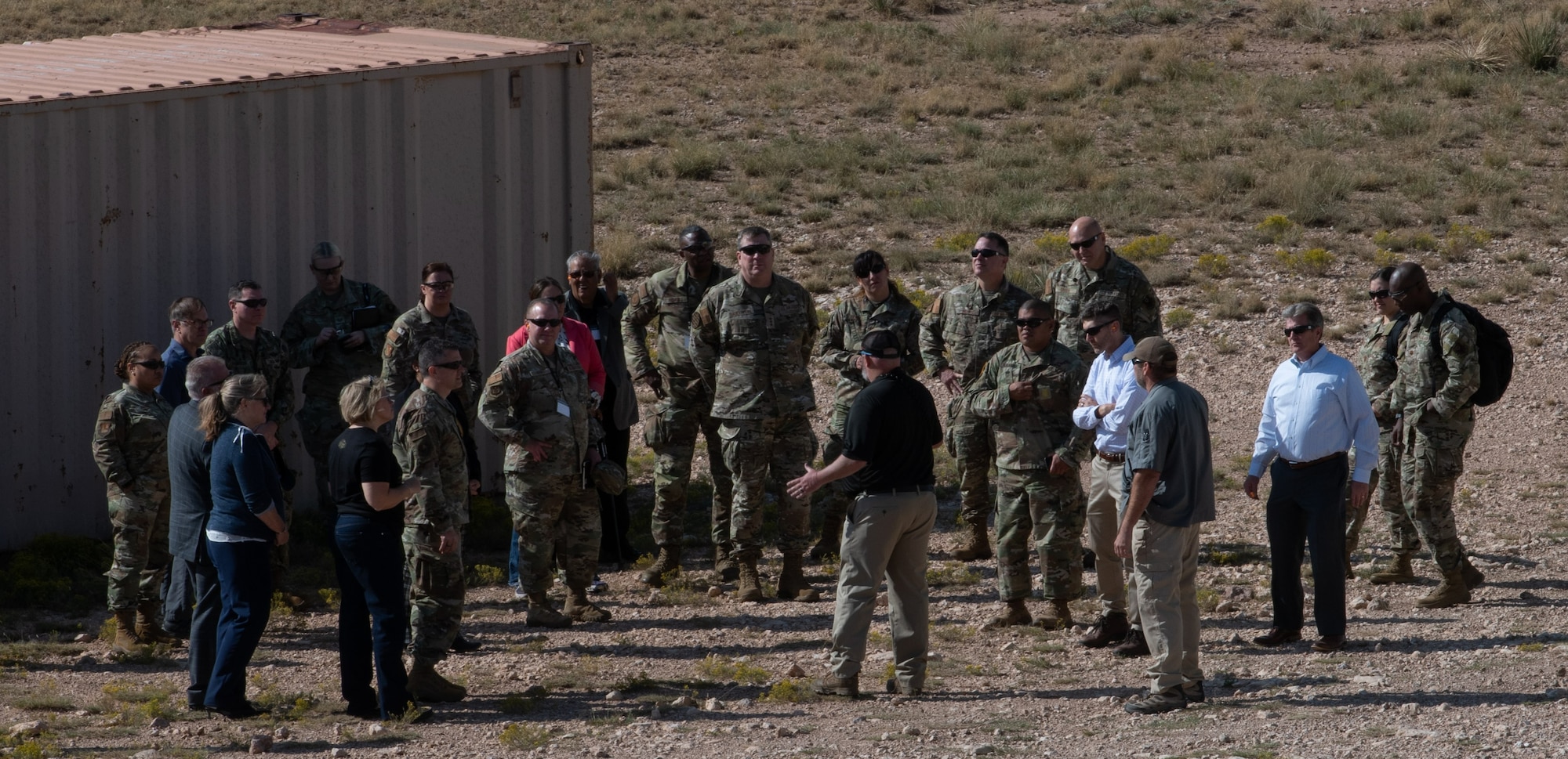 Participants of the Medical Support Summit receive a range safety briefing on Melrose Air Force Range