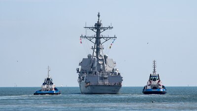 The future USS Jack H. Lucas (DDG 125) departs Ingalls Shipbuilding in Pascagoula, Miss.