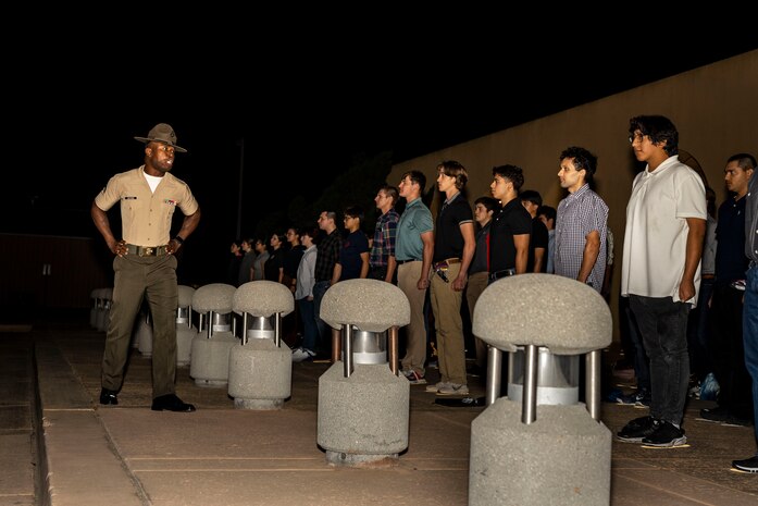 U.S. Marine Corps Sgt. Keith Saydee, a drill instructor with Receiving Company, Support Battalion, instructs new recruits with Lima Company, 3rd Recruit Training Battalion, during receiving at Marine Corps Recruit Depot San Diego, Sept. 25, 2023. Receiving is the first event during recruit training where recruits are checked for contraband, given a haircut, issued gear and make a phone call
home. Saydee is a native of Lansdowne, Pa. (U.S. Marine Corps photo by Sgt. Yvonna Guyette)