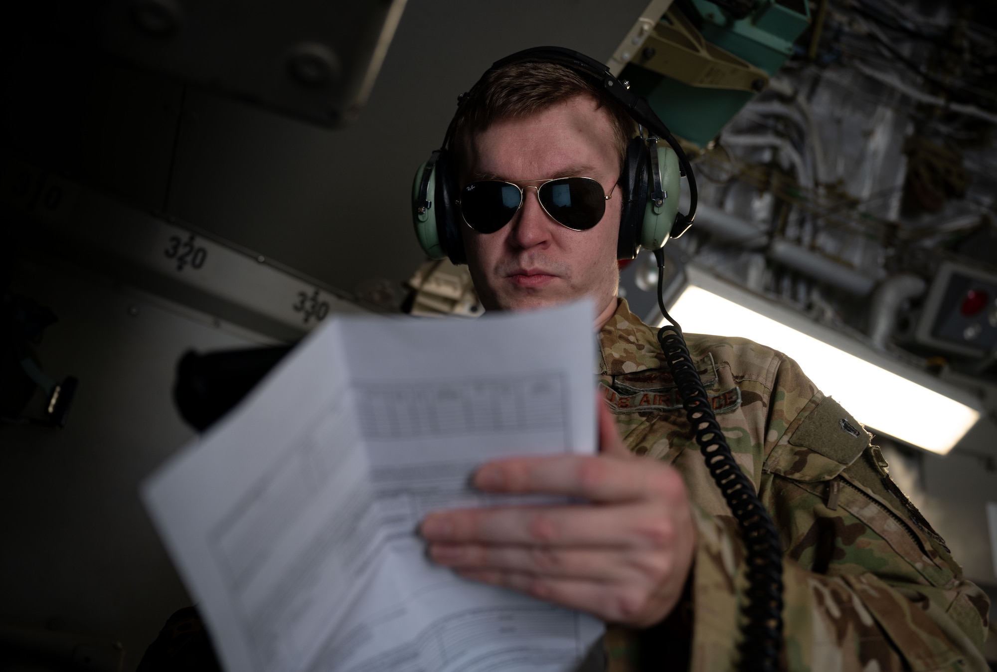U.S. Air Force Tech. Sgt. Cody Deranick, 3rd Airlift Squadron loadmaster, performs preflight checks on a U.S. Air Force C-17 Globemaster III at Dover Air Force Base, Delaware, Sept. 6, 2023. The departing C-17 participated in Exercise Castaway 23-3, a Total Force, Interagency training exercise designed to train and update local search and rescue procedures. (U.S. Air Force photo by Airman 1st Class Amanda Jett)