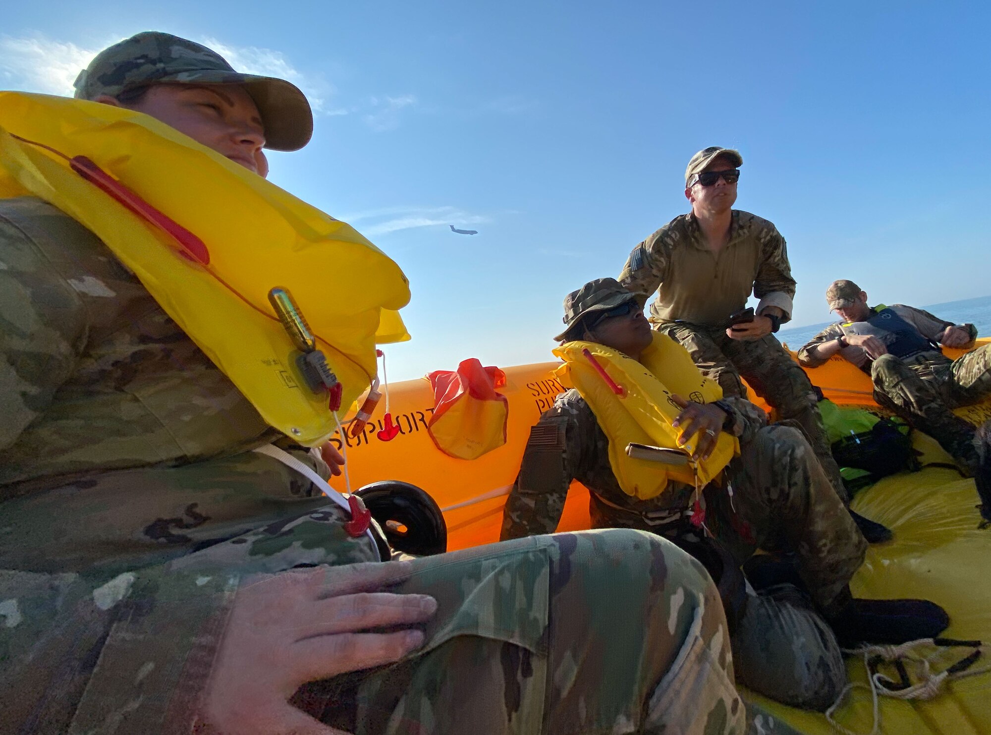 Exercise Castaway 23-3 participants sit in a survival raft near Indian River Inlet, Delaware, Sept. 6, 2023. Castaway 23-3 was a total force interagency training exercise designed to train and update local search and rescue procedures. (U.S. Air Force photo by Airman 1st Class Dieondiere Jefferies)