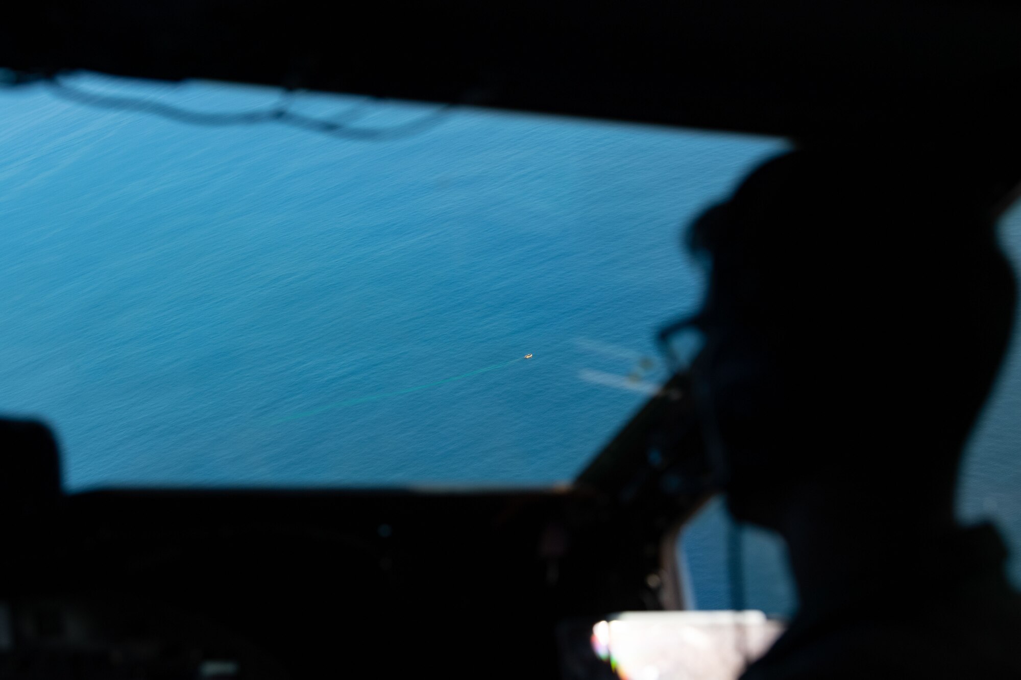 U.S. Air Force Capt. Jacob DePledge, 9th Airlift Squadron pilot, maneuvers a U.S. Air Force C-5M Super Galaxy to maintain visual contact with a life raft during Exercise Castaway 23-3 near Indian River Inlet, Delaware, Sept. 6, 2023. Castaway 23-3 was a Total Force, Interagency training exercise designed to train and update local search and rescue procedures. (U.S. Air Force photo by 1st Lt. Trevor Wood)