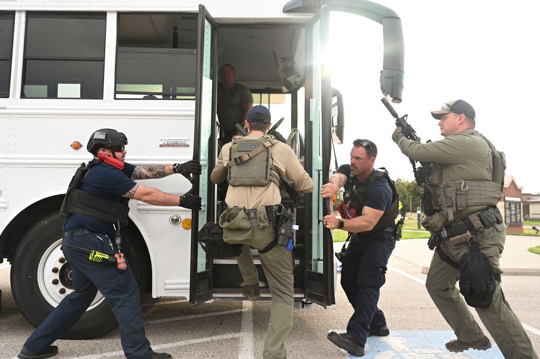 Members assigned to the 17th Training Wing team up with Tom Green County Sheriff's Office officers during the Rescue Task Force course of the Threat Suppression Inc. exercise, Goodfellow Air Force Base, Texas, Sep. 21, 2023. Goodfellow AFB and the local community came together for a week of classroom and practical exercises to prepare them for real world scenarios. They went through training regarding protocol for different environments, locations, and scenarios. (U.S. Air Force photo by Airman 1st Class Madison Collier)