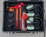 The 5th Aircraft Maintenance Squadron’s new wireless headset kit displayed at Minot Air Force Base, North Dakota, Sept. 19, 2023. The wireless headset kit gives Airmen increased mobility while maneuvering around the B-52H Stratofortress. (U.S. Air Force photo by Senior Airman Evan Lichtenhan)